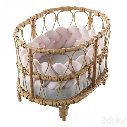 Rattan doll bed