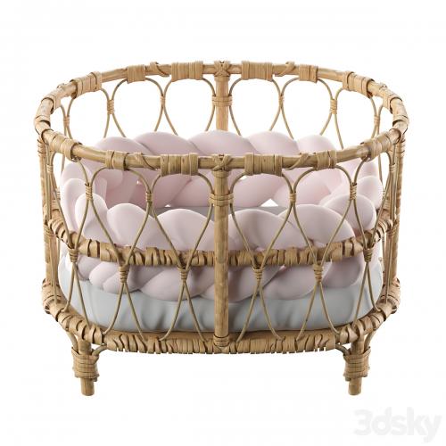 Rattan doll bed