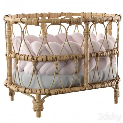 Rattan doll bed