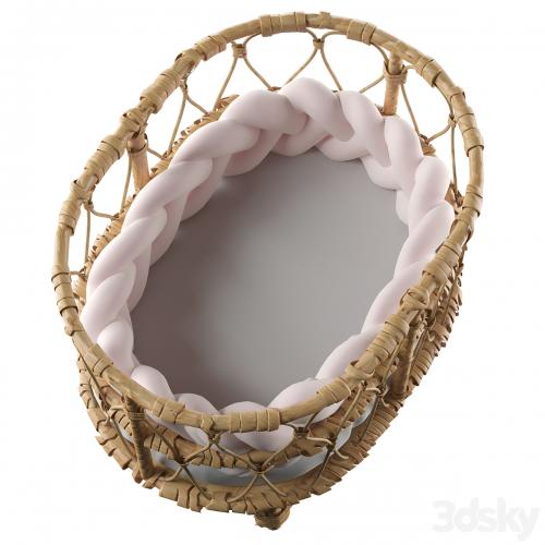 Rattan doll bed