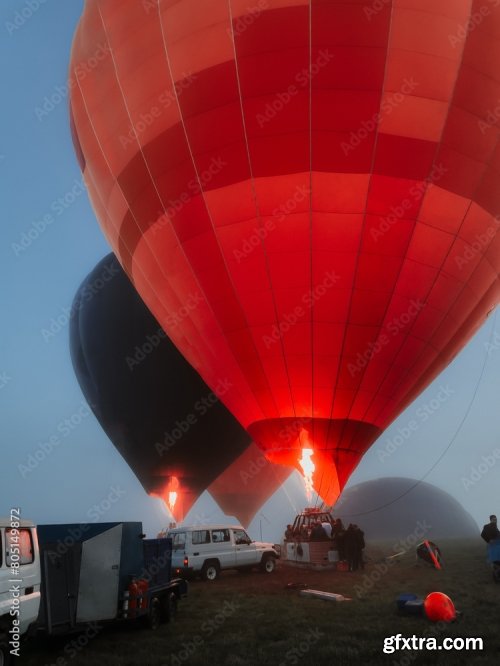 Hot-Air Balloon Flying Over The Hills And Mountains Above The Clouds 6xJPEG