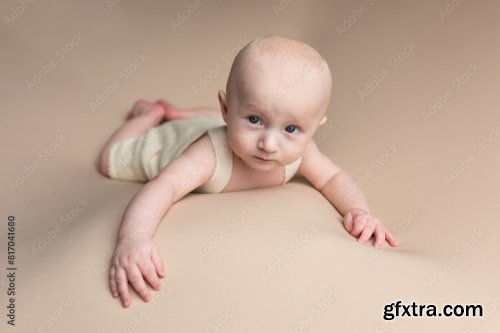 A Small Child On A Light Background 6xJPEG