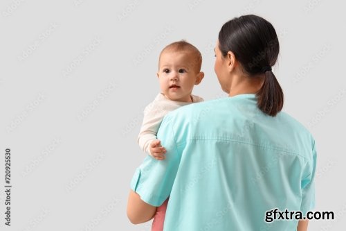 Female Pediatrician With Little Baby 6xJPEG