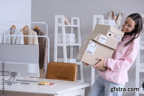 Female Seller With Parcel In Warehouse Store 6xJPEG