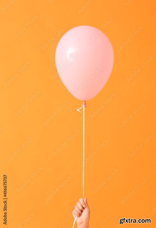 Hand With Air Balloons On Color Background 6xJPEG