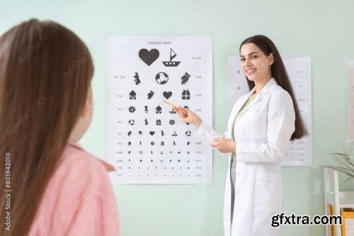 Female Ophthalmologist Checking Little Girl 6xJPEG