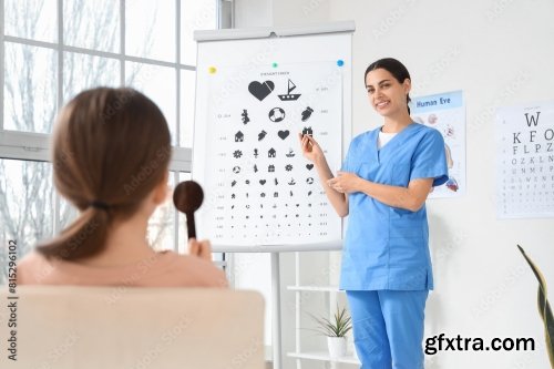 Female Ophthalmologist Checking Little Girl 6xJPEG