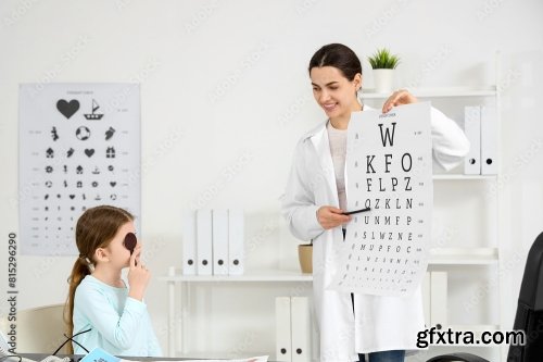 Female Ophthalmologist Checking Little Girl 6xJPEG