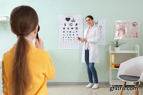 Female Ophthalmologist Checking Little Girl 6xJPEG