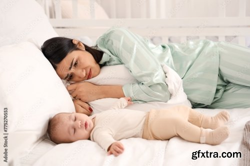 Young Woman With Her Baby Suffering From Postnatal Depression 6xJPEG