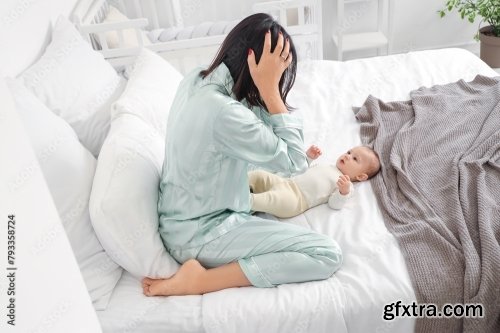 Young Woman With Her Baby Suffering From Postnatal Depression 6xJPEG