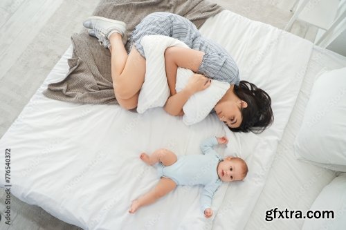 Young Woman With Her Baby Suffering From Postnatal Depression 6xJPEG