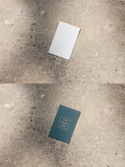 Vertical Business Card Mockup on a Concrete Background