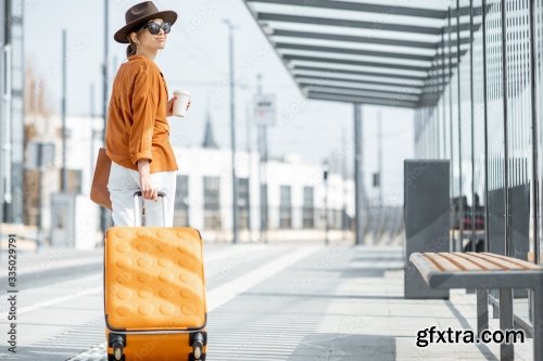 Young Female Traveler With A Luggage At The Transport Stop 6xJPEG