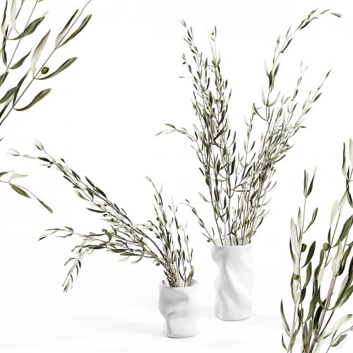 Collapse vase by Menu with branches