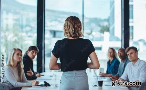 Group Of Business Professionals In A Productive Discussion At A Conference Meeting 4xJPEG