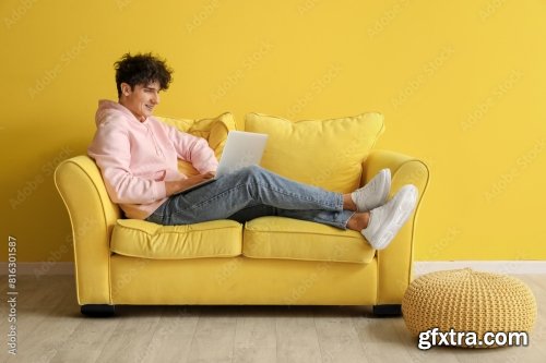 Young Man Resting On Soft Sofa 6xJPEG