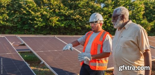 Latin Farmer Talking With The Technician Who Installed Photovoltaic Panels On His Farm In Brazil 6xJPEG