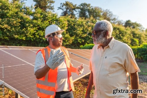 Latin Farmer Talking With The Technician Who Installed Photovoltaic Panels On His Farm In Brazil 6xJPEG