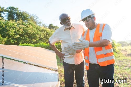 Latin Farmer Talking With The Technician Who Installed Photovoltaic Panels On His Farm In Brazil 6xJPEG