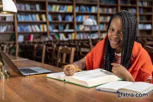 Long-Haired Young Woman In Red Clothes Studying In The Library 6xJPEG