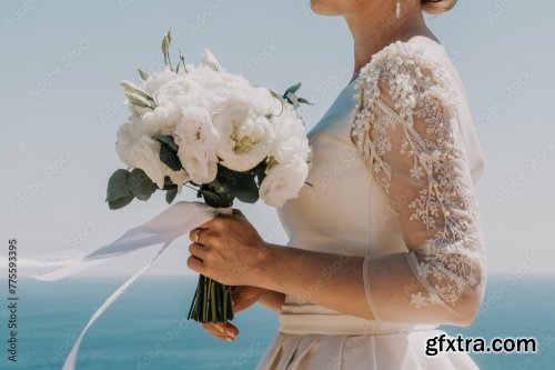 A Woman Is Holding A Bouquet Of Pink And White Flowers 6xJPEG