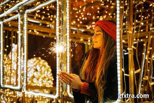 Woman Holding Sparkler Night While Celebrating Christmas Outside 6xJPEG