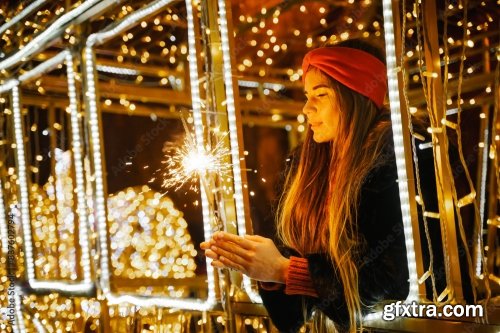 Woman Holding Sparkler Night While Celebrating Christmas Outside 6xJPEG