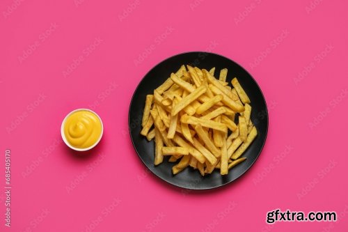 Plate With Golden French Fries And Cheese Sauce 6xJPEG