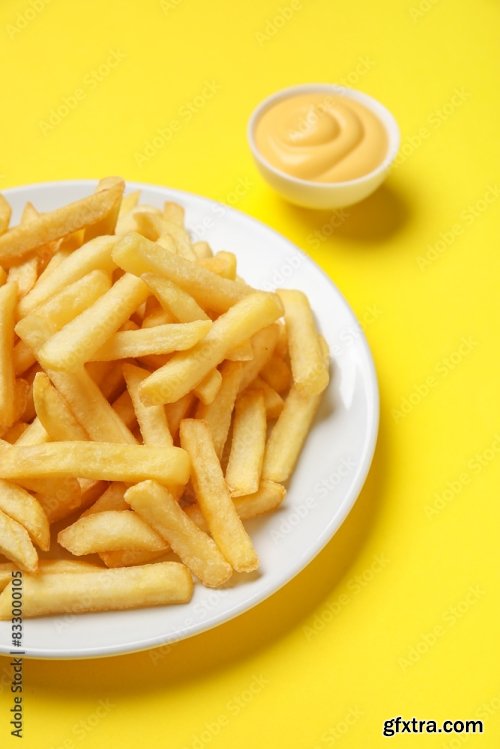 Plate With Golden French Fries And Cheese Sauce 6xJPEG