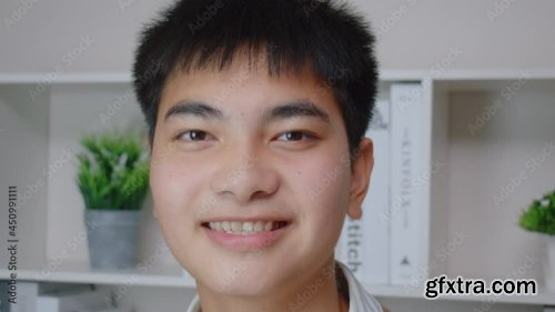 Asian Teenager Smile And Looking On Camera In Library At High School 0x