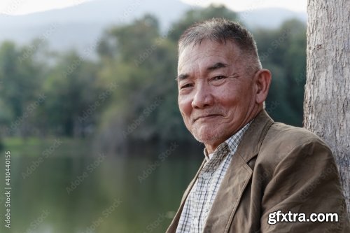 Asian Old Man Sitting And Relaxing 8xJPEG