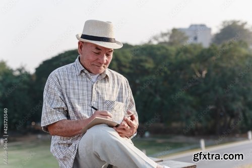 Asian Old Man Sitting And Relaxing 8xJPEG