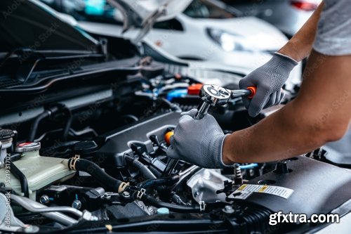 Mechanic Using Wrench While Working On Car Engine 6xJPEG
