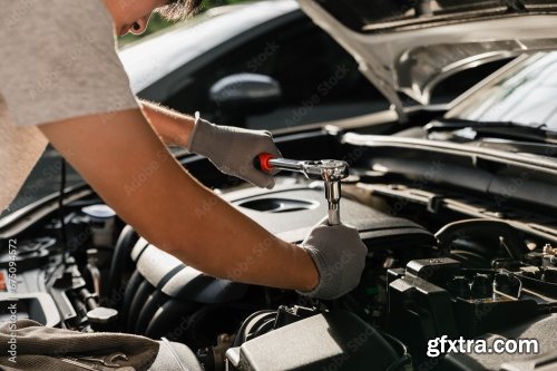 Mechanic Using Wrench While Working On Car Engine 6xJPEG