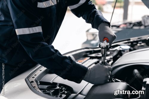 Mechanic Using Wrench While Working On Car Engine 6xJPEG