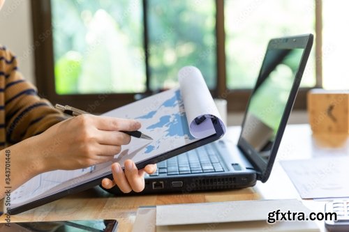 Businessman Reading Some Documents 13xJPEG