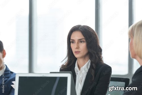 Businesswoman In Meeting 4xJPEG