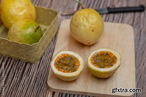 Thai Passion Fruit Isolated Slice On Wooden Plate 8xJPEG