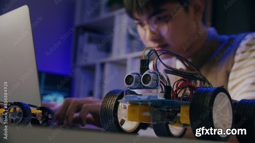 Asian Teenager Doing Arduino Robot 15xJPEG