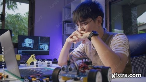 Asian Teenager Doing Arduino Robot 15xJPEG