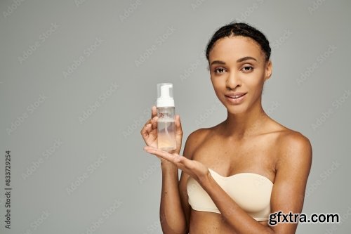 Cosmetic And Young African American Woman 24xJPEG