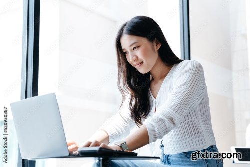 Asian Young Woman Working With Laptop 5xJPEG