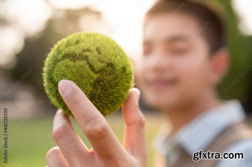 Asian Teenager Showing Earth On Hand 11xJPEG