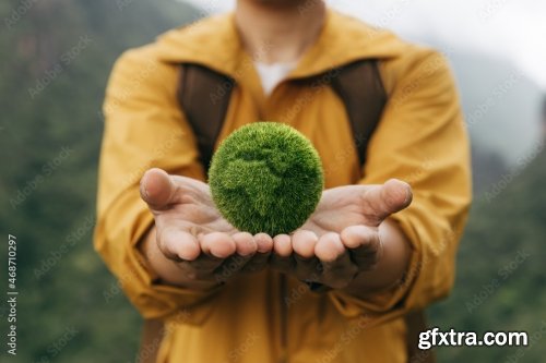 Asian Teenager Showing Earth On Hand 11xJPEG