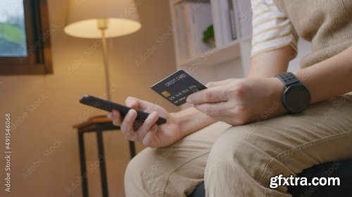 Young Man Making Payment And Shopping By Credit Card 8xJPEG