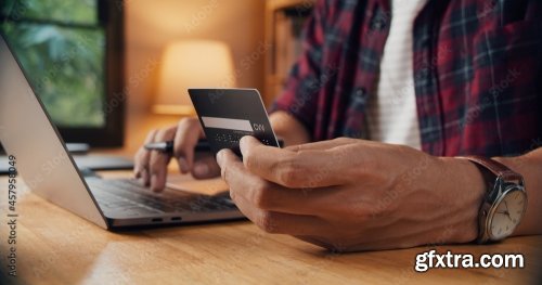 Young Man Making Payment And Shopping By Credit Card 8xJPEG