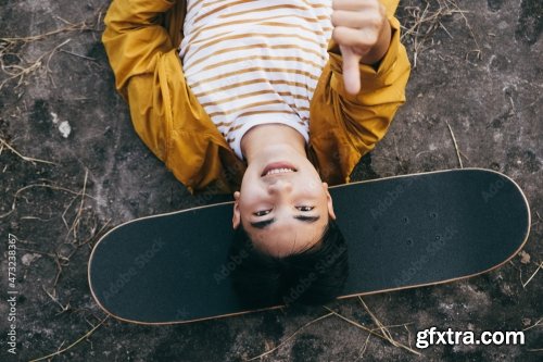 Teenager Playing Skateboard At Cement Ground 8xJPEG