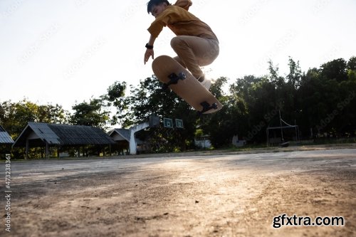 Teenager Playing Skateboard At Cement Ground 8xJPEG