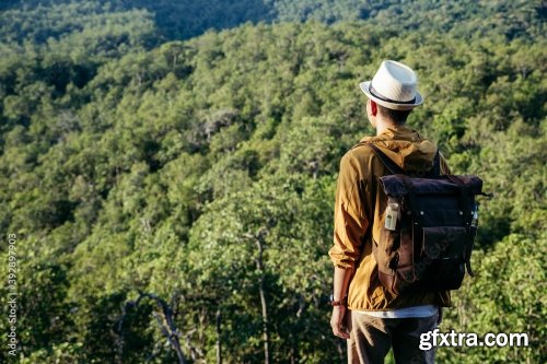 Traveler Standing On The Edge Of A Cliff And Look Around At The Mountain 6xJPEG